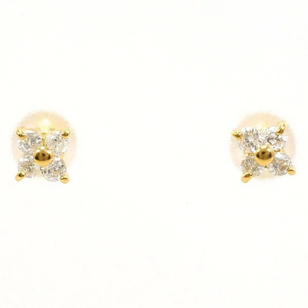 18K (18-karat) yellow gold earrings with two 0.10-carat diamonds. Total weigh...